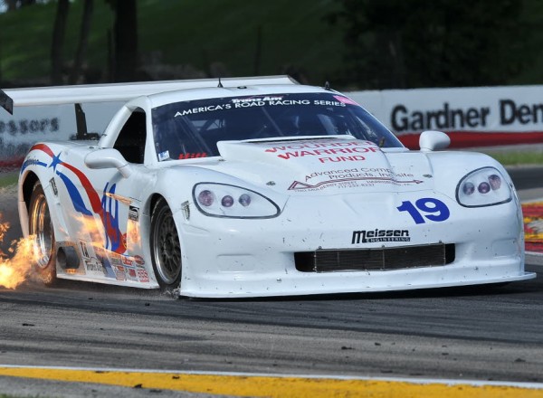 Trans Am racer Kerry Hitt lights it up in his Chevrolet Corvette.  [John Wiedemann Photo]