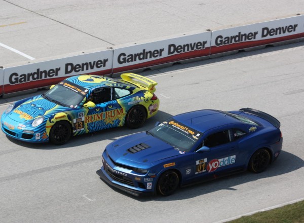 Lawson Aschenbach passes Matt Plumb on the Road America frontstretch.  [Mark Walczak Photo]