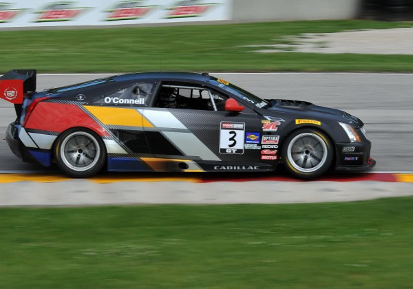 Johnny O’Connell races through turn 7 at Road America in his Cadillac.  [John Wiedemann Photo]