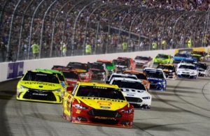 Joey Logano leads the field past the green flag to start the NASCAR Sprint Cup Series Federated Auto Parts 400 at Richmond International Raceway on September 12, 2015. [Credit: Robert Laberge/NASCAR via Getty Images]