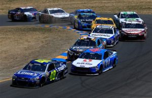 Jimmie Johnson leads a pack of cars during the 2016 Toyota/Save Mart 350 at Sonoma Raceway. [Photo by Chris Trotman/NASCAR via Getty Images]