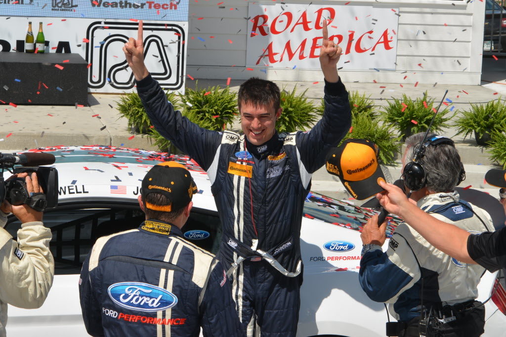 Billy Johnson celebrates the victory with co-driver Scot t Maxwell. [Dave Jensen Photo]