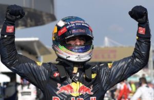 Red Bull's Daniel Ricciardo celebrates hi win in the Grand Prix of Malaysia. [Photo courtesy of Mohd Rasfan of AFP/Getty Images]