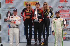 Johnny O'Connell (3rd place), Patrick Long (Winner) and Adderly Fong (2nd place) on the Pirelli World Challenge podium. [Dave Jensen Photo]