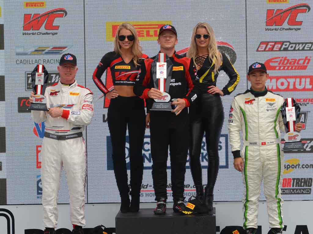 Johnny O'Connell (3rd place), Patrick Long (Winner) and Adderly Fong (2nd place) on the Pirelli World Challenge podium. [Dave Jensen Photo]