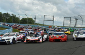 Large field of cars in all classes that displayed patriotic colors.  [Joe Jennings Photo]