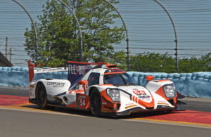 Pole winning CORE Autosport team cruises over rumble strips en route to first place. [Joe Jennings Photo]