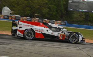 Fernando Alonso steers a Toyota Gazoo Racing Hybrid around the 3.74-mile course at Sebring.   Not only did Alonso and his teammates win the 1000 mile race but he set a qualifying record when he lowered the standard by 3 seconds. [Joe Jennings Photo}