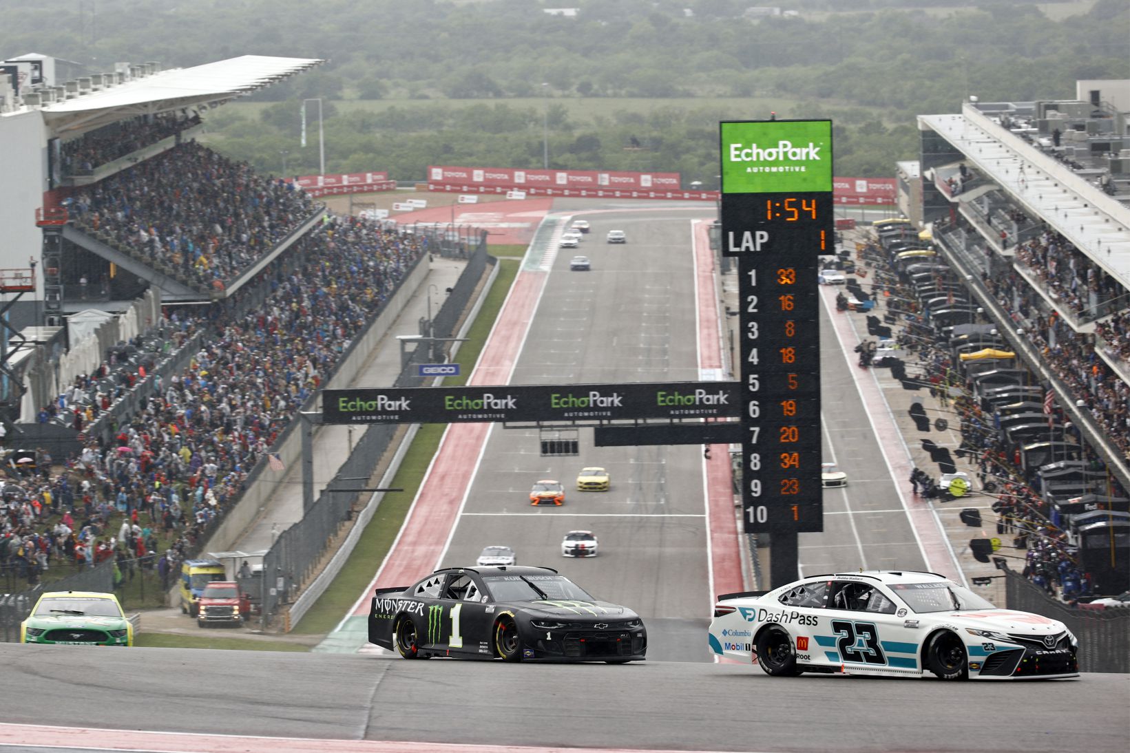 Bubba Wallace and Kurt Busch race during the NASCAR Cup Series EchoPark Texas Grand Prix at Circuit of The Americas on May 23, 2021 in Austin, Texas. (Photo by Jared Tilton/ 23XI Racing via Getty Images)