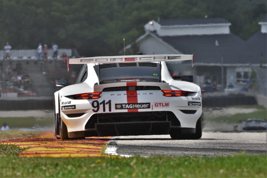 Porsche #911 races down to Turn 8. [John WIedemann Photo]