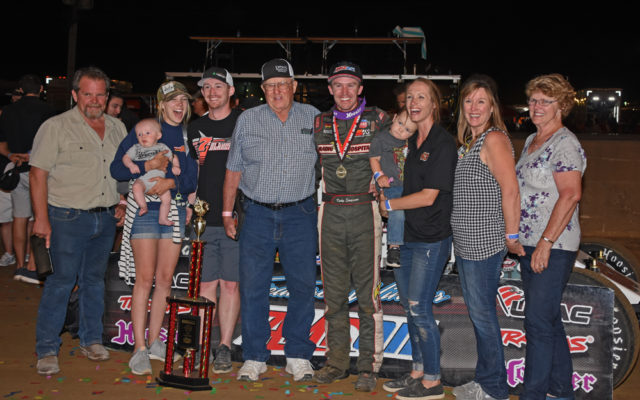 Kody Swanson and family all aglow in victory lane after Kody won the Hoosier 100 for the fourth consecutive time.  [Joe Jennings Photo]