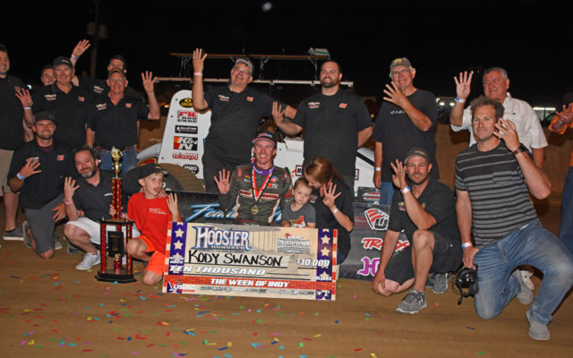 DePalma Motorsports team hold up 4 fingers as a result of winning the Hoosier 100 for the fourth year in a row.  [Joe Jennings Photo]