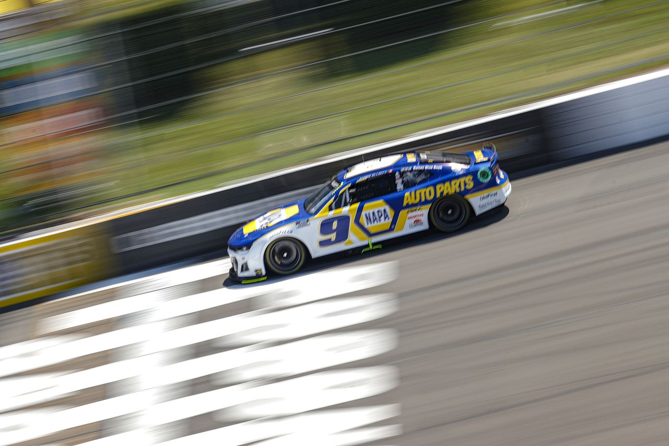 Chase Elliott, racing during the NASCAR Cup Series M&M's Fan Appreciation 400 at Pocono Raceway. (Photo by Tim Nwachukwu/Getty Images)
