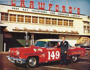 Crawford poses in front of the Crawford’s Grocery store with his Pan American race winning Lincoln.  Photo courtesy of the author, Andrew Layton