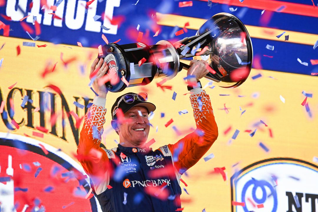 Scott Dixon celebrates with the trophy after winning the Big Machine Music City Grand Prix. [Media Credit-Penske Entertainment: James Black]